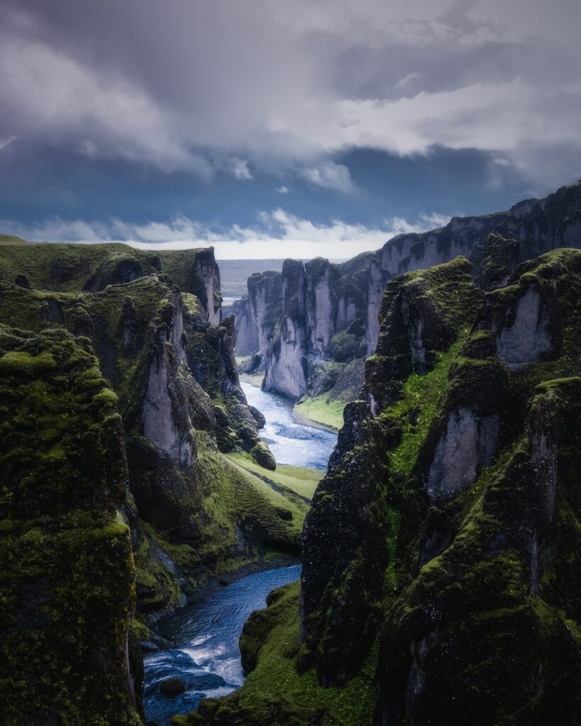 aerial photography of river between mountains during daytime