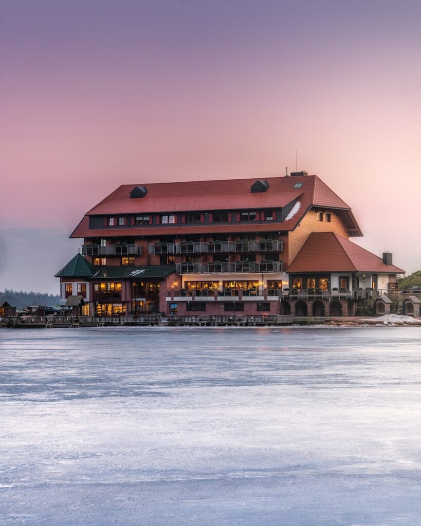 a large building sitting on top of a body of water